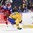 BUFFALO, NEW YORK - DECEMBER 31: Russia's Alexei Polodyan #27 attempts to side step Sweden's Jacob Moverare #27 during preliminary round action at the 2018 IIHF World Junior Championship. (Photo by Matt Zambonin/HHOF-IIHF Images)


